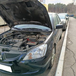 Замена аккумулятора на Mitsubishi Lancer IX Рестайлинг 2005 - 2010 1.6 (98 л.с.) Замена аккумулятора на Mitsubishi Lancer IX Рестайлинг 2005 - 2010 1.6 (98 л.с.)